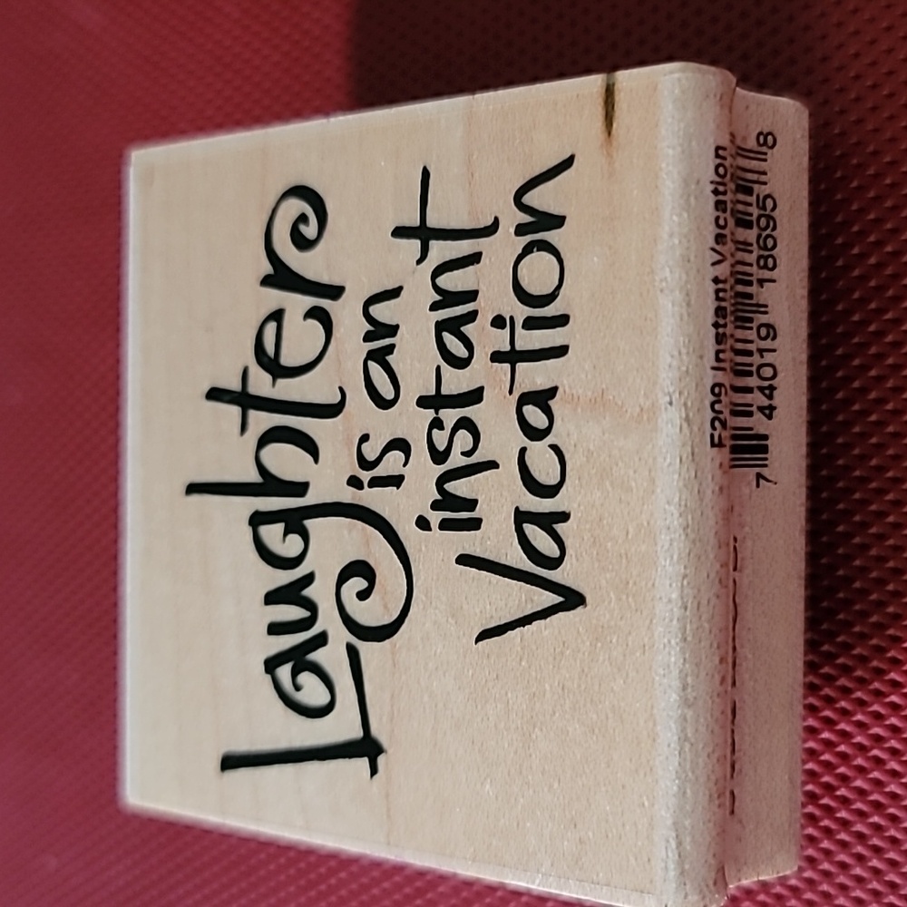 Phrase:laughter is an instant vacation wooden rubber stamp